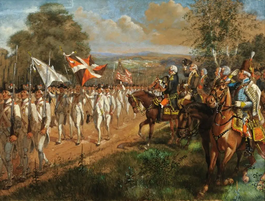 Les troupes françaises et américaines défilant devant George Washington suite à leur victoire lors du siège de Yorktown (1781)